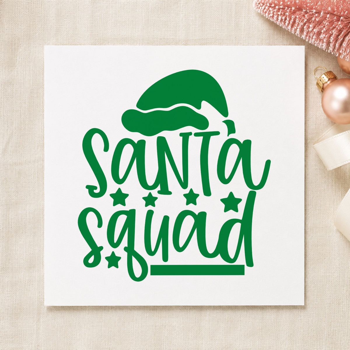 Santa Squad Hat Stars craft stamp imprint in green ink on a handmade project, one idea being member number tags.