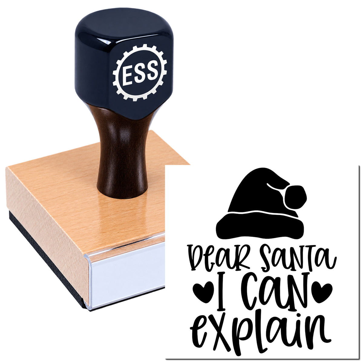 Dark blue ESS rubber stamp on wooden block, with black "Dear Santa I CAN explain" seal design and Santa hat icon.