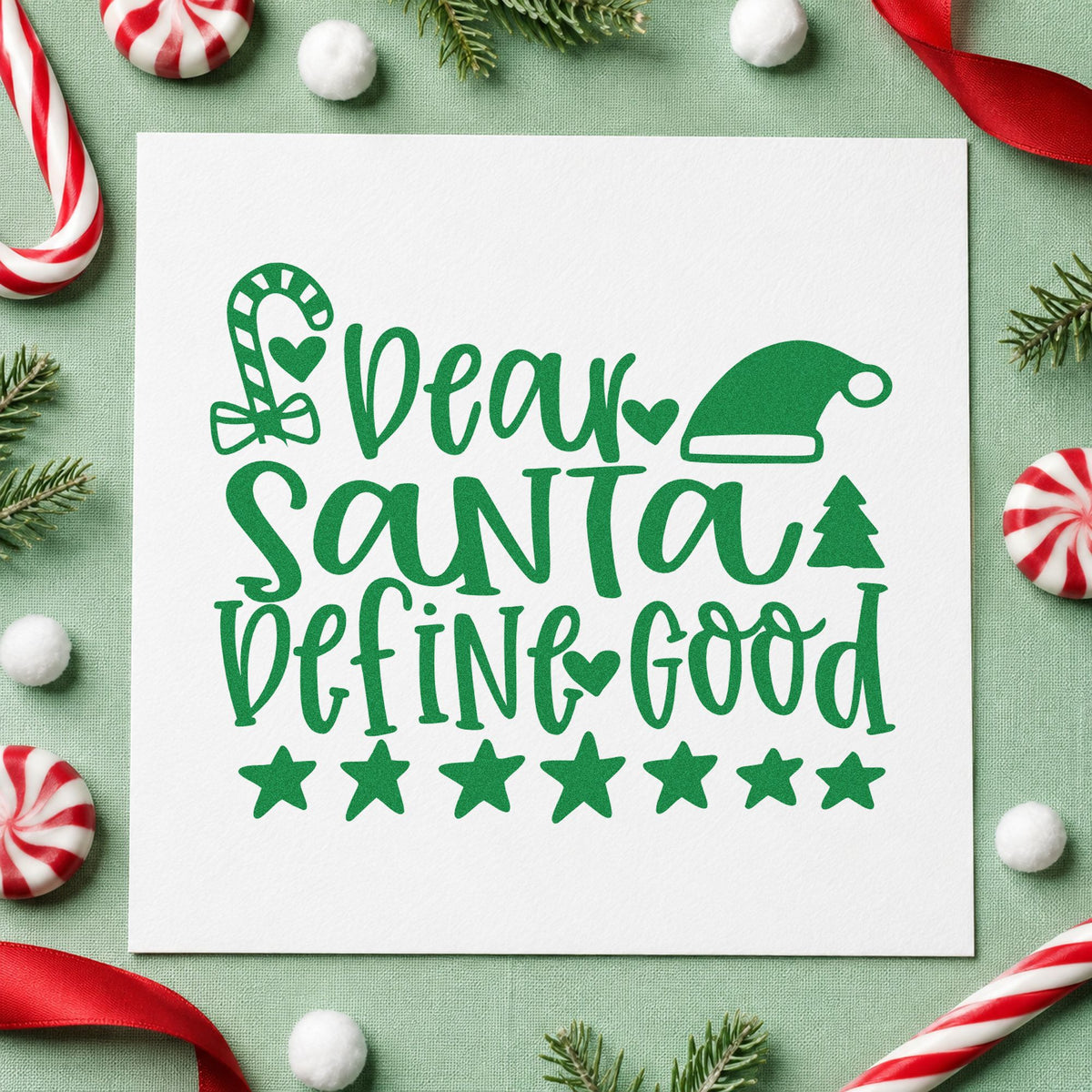 Dear Santa Define Good craft stamp imprint in green ink on a handmade project, one idea being cane bundle tags.
