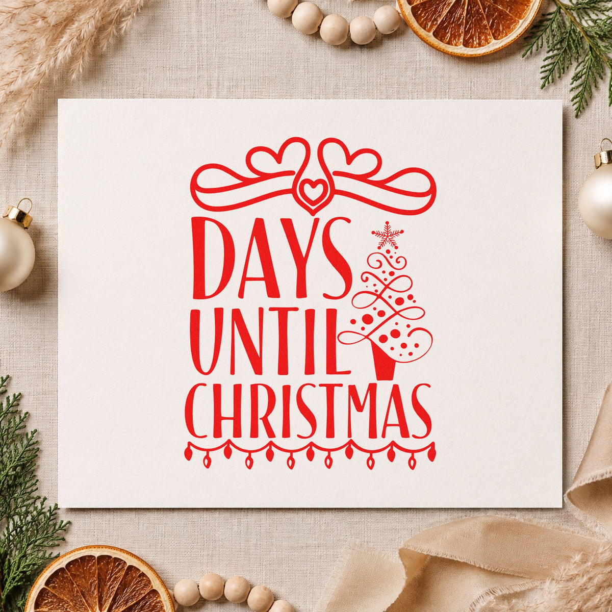 Days Until Christmas Bow rubber stamp shown in red ink, stamped for projects such as reel cord labels.