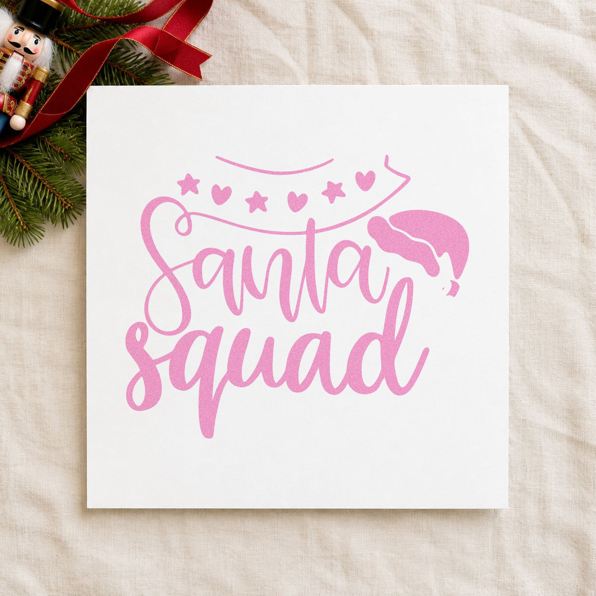 Santa Squad Heart Garland craft stamp in purple ink on cardstock, an easy option for group album page.