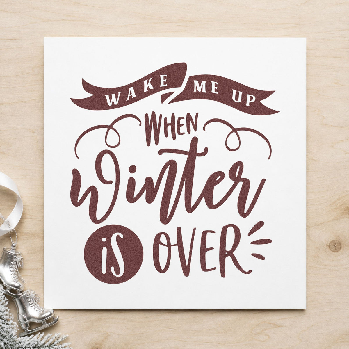 Wake Me When Winter Ends rubber stamp printed in brown ink, ready for trip packing sheet and similar paper crafts.