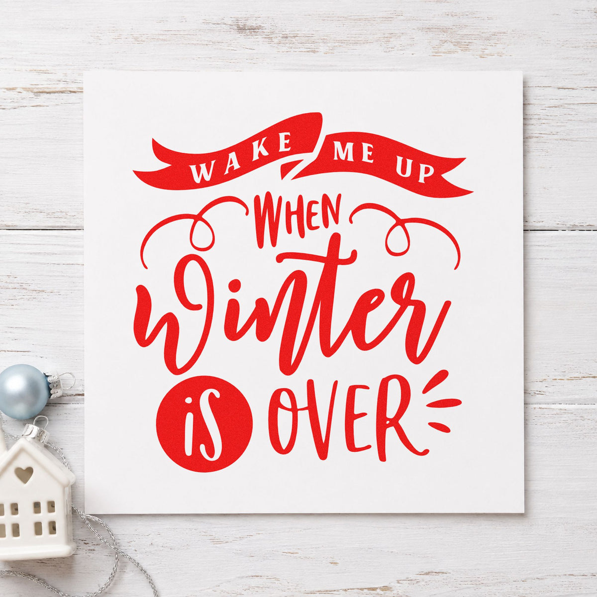 Wake Me When Winter Ends craft stamp in red ink on cardstock, an easy option for beach towel printing.