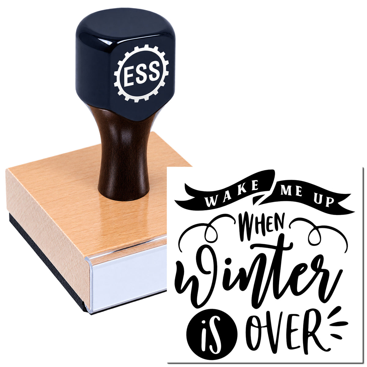 Dark navy ESS rubber stamp on wood base with black "Wake me up when winter is over" seal design.
