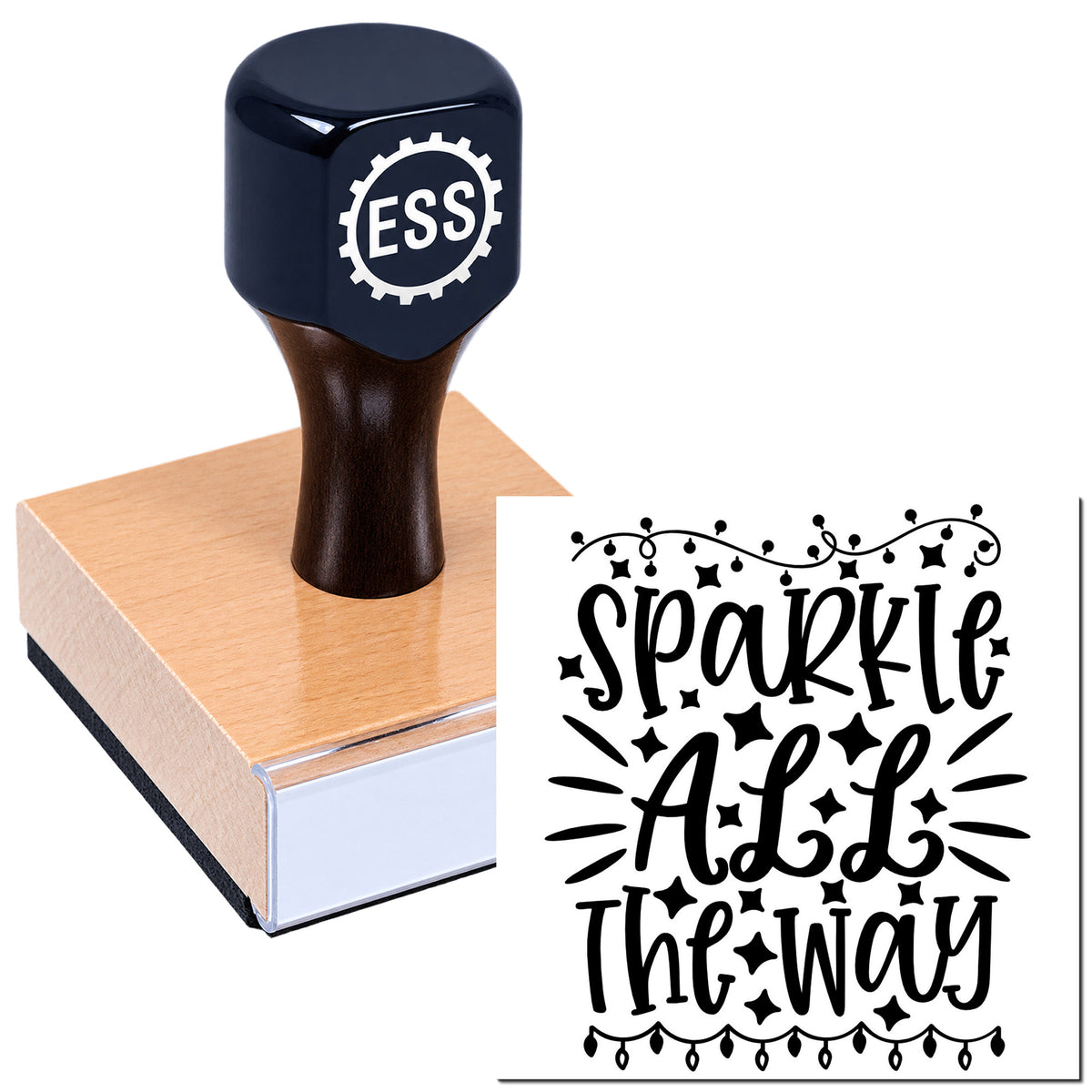 Dark blue self-inking stamp on wood block, showing black "Sparkle All the Way" seal design with stars and hanging lights.