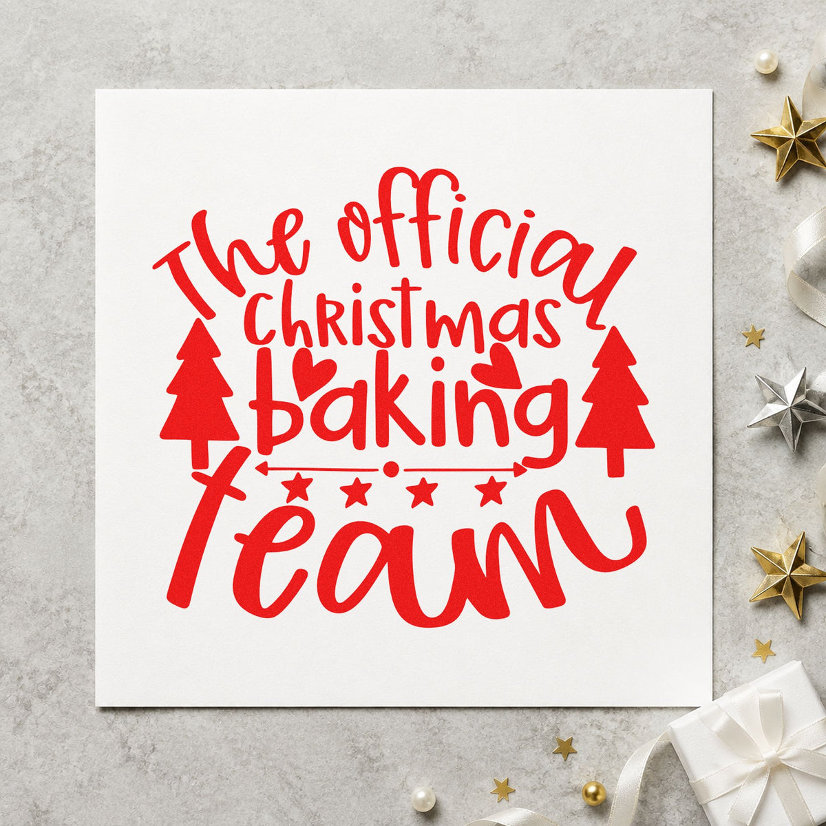 Official Christmas Baking Team craft stamp in red ink on cardstock, an easy option for team apron printing.