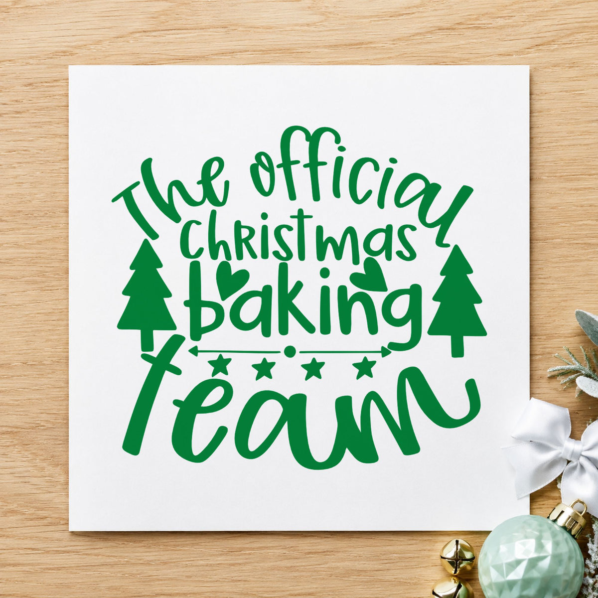 Official Christmas Baking Team craft stamp imprinted in green ink on paper, a design suited to framed judging table.