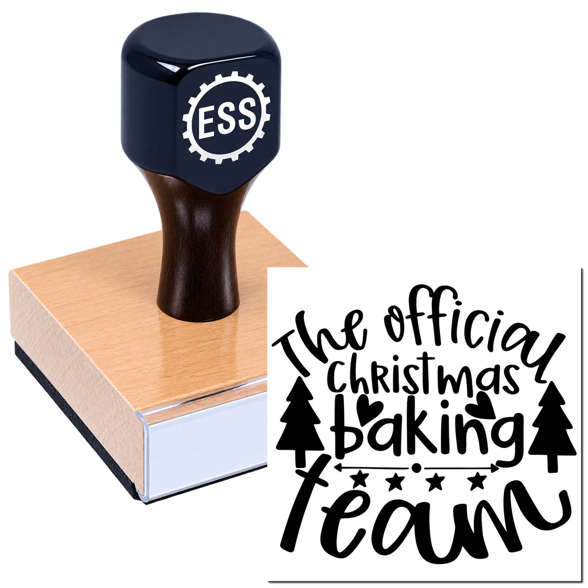 Black ESS self-inking stamp on pink pad, with festive seal reading "The official Christmas baking team" and tree icons.