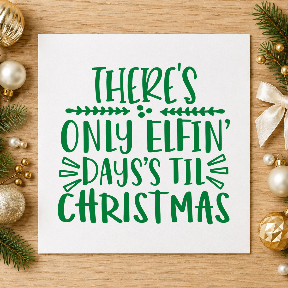 Only Elfin Days Til Christmas craft stamp imprint in green ink on a handmade project, one idea being numbered gift tags.