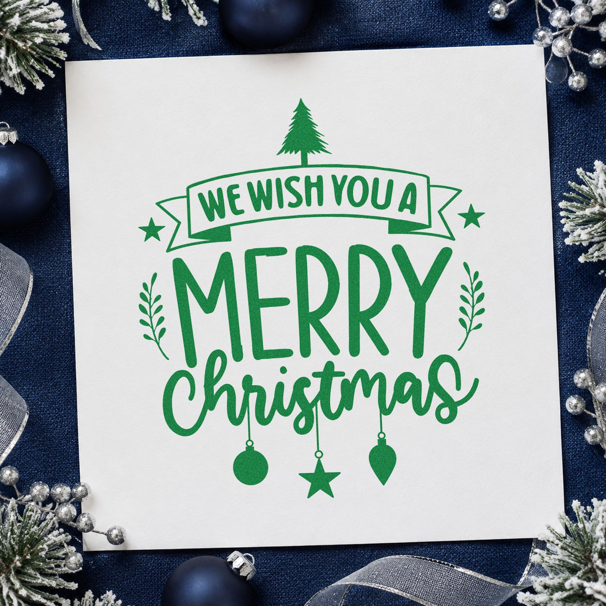 We Wish You Merry Christmas craft stamp imprinted in green ink on paper, a design suited to framed large piece.