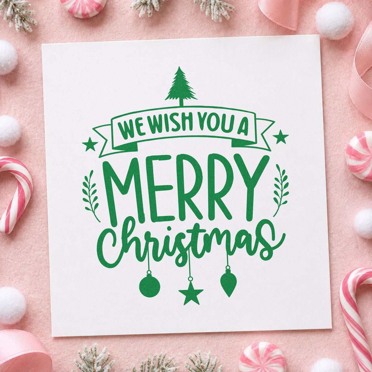 We Wish You Merry Christmas craft stamp imprint in green ink on a handmade project, one idea being program cover cards.