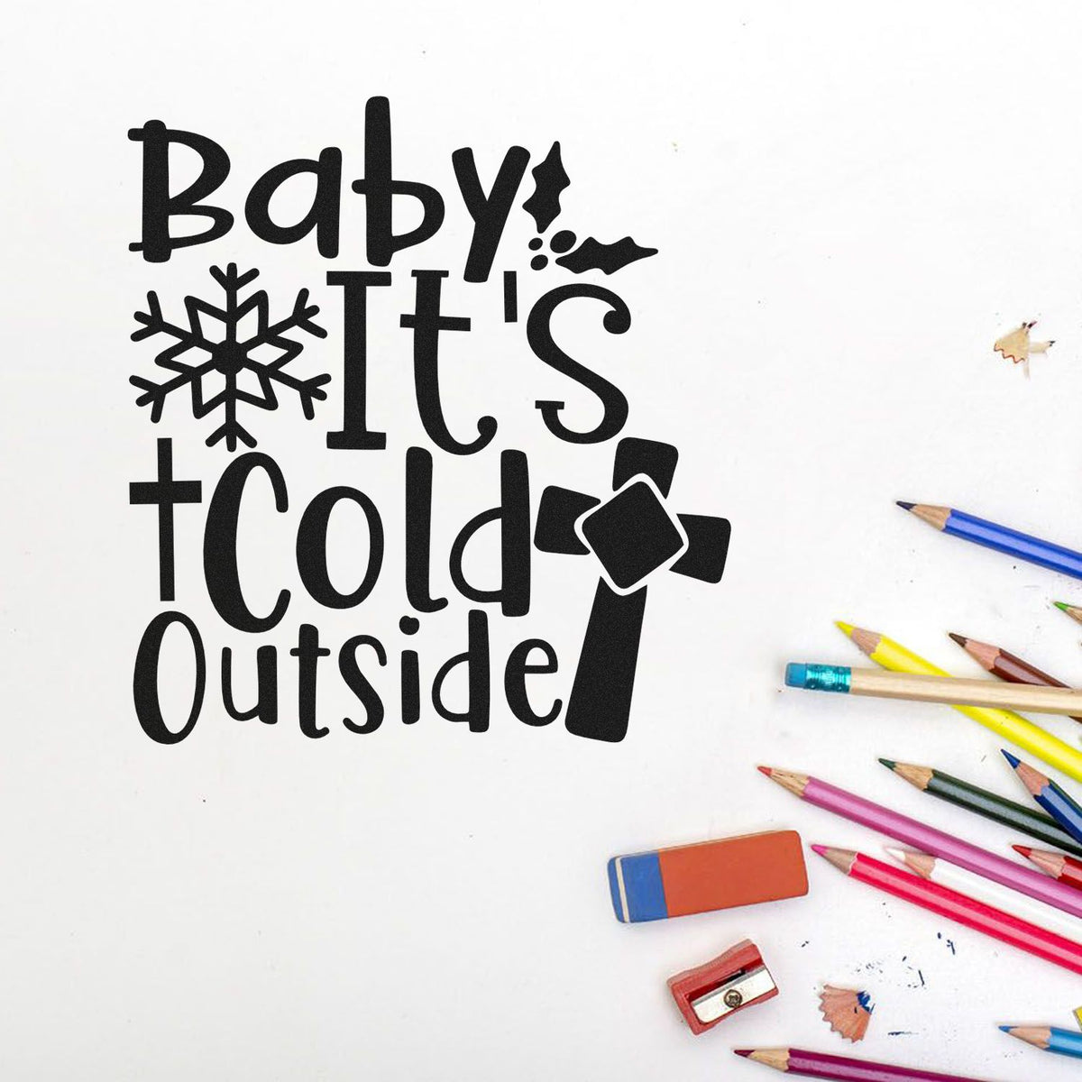 Black winter stamp and seal reading Baby its cold outside, with a snowflake, mitten and colored pencils on white background