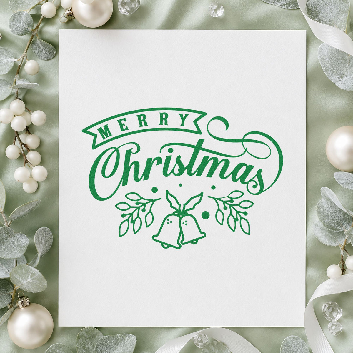 Merry Christmas Bells And Leaves craft stamp imprint in green ink on a handmade project, one idea being ribbon trim tags.