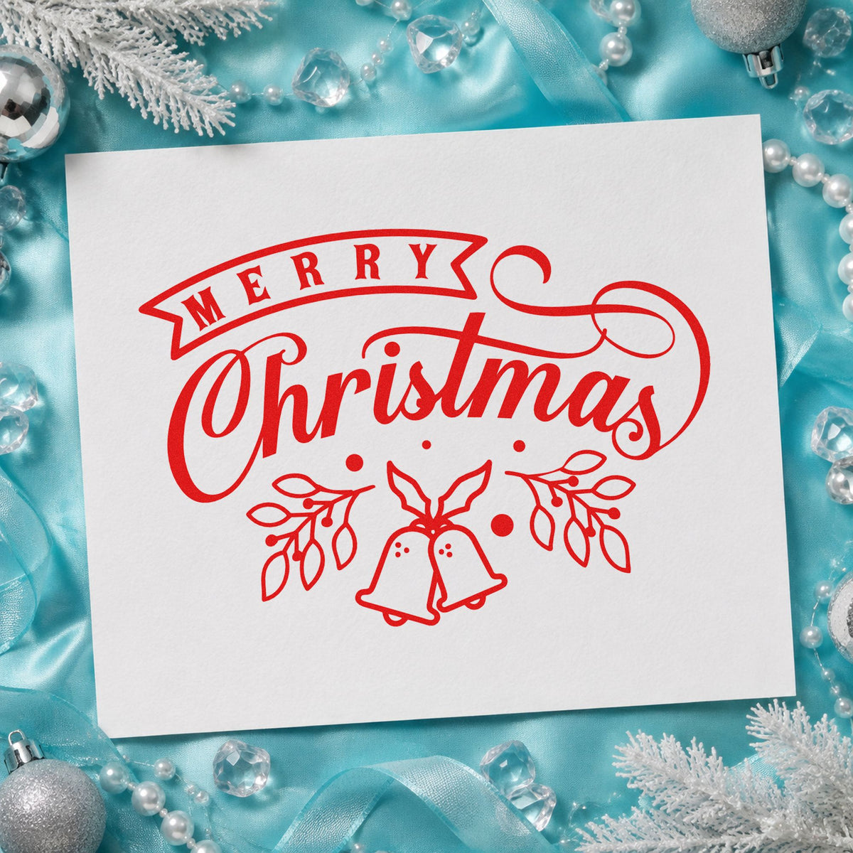 Merry Christmas Bells And Leaves craft stamp in red ink on cardstock, an easy option for sash length printing.