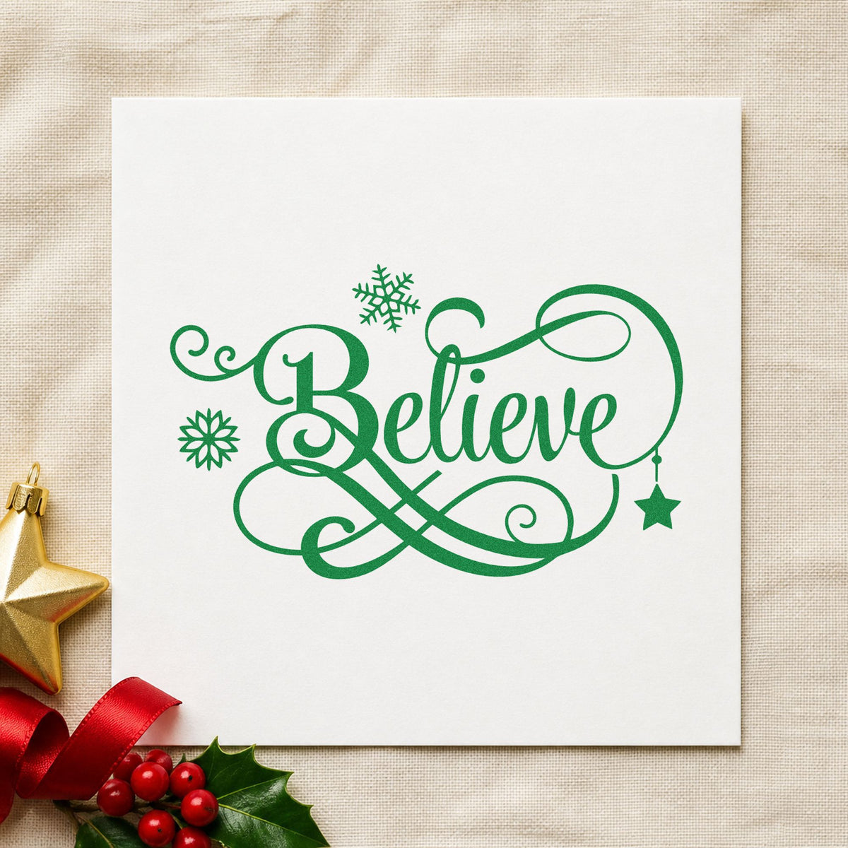 Believe Snowflakes Hanging Star craft stamp imprint in green ink on a handmade project, one idea being thread loop tags.