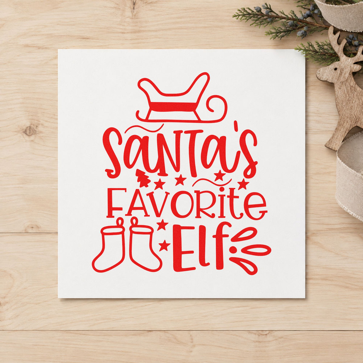 Santa's Favorite Elf Stockings craft stamp in red ink on cardstock, an easy option for cuff set printing.