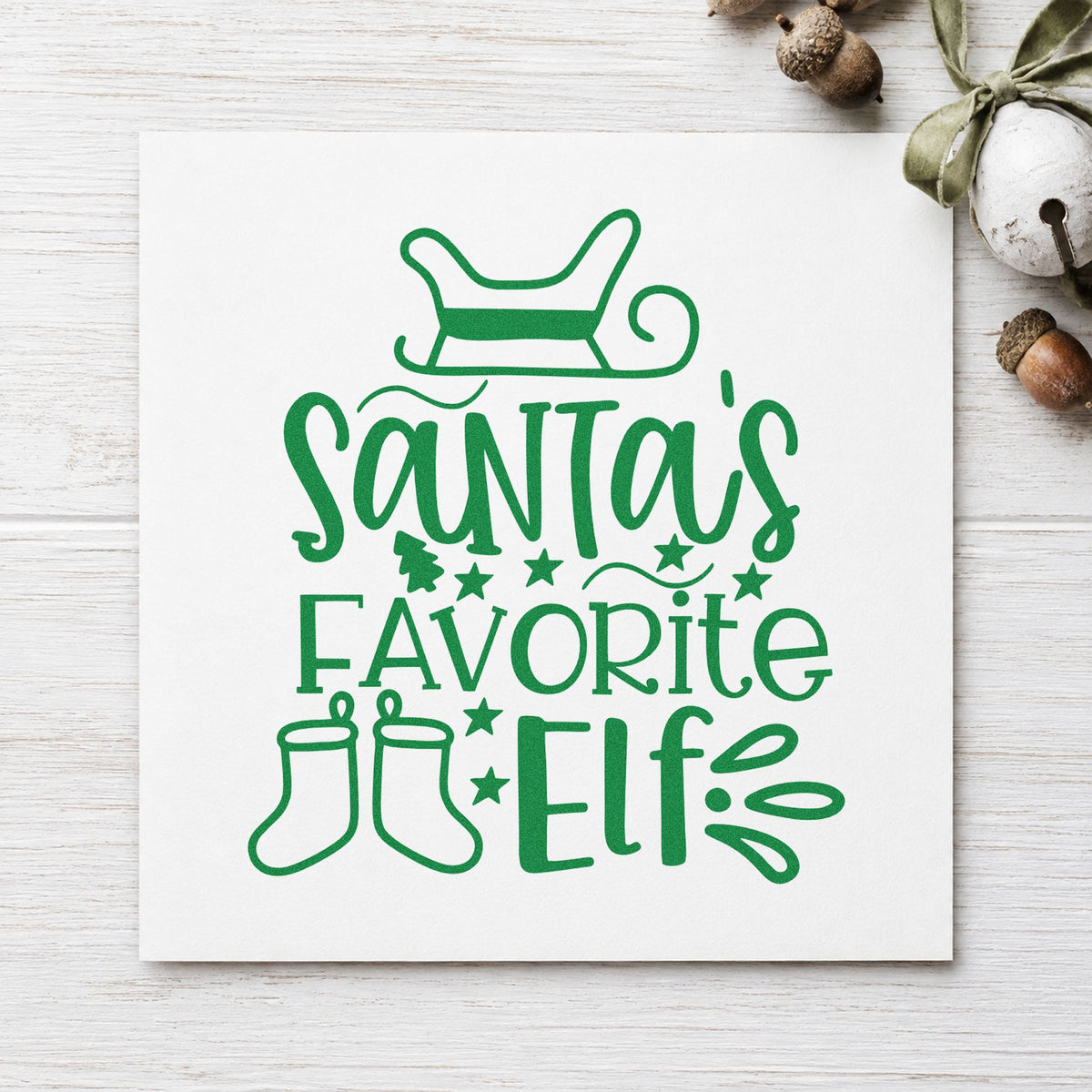 Santa's Favorite Elf Stockings craft stamp imprinted in green ink on paper, a design suited to framed hook span.