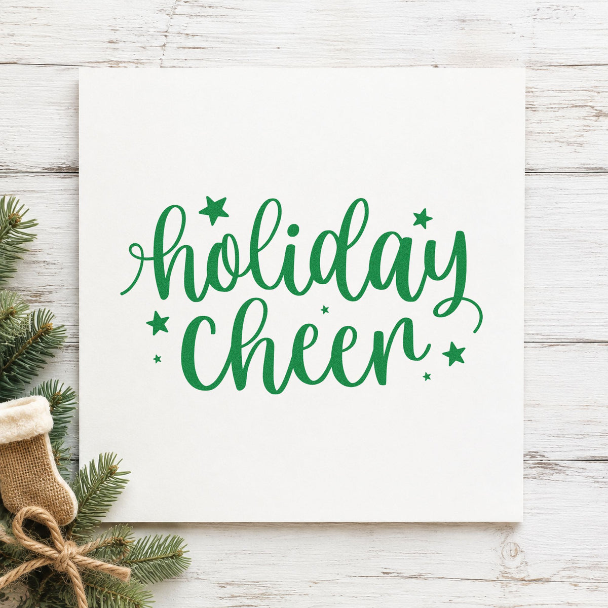 Holiday Cheer Star Lettering craft stamp imprint in green ink on a handmade project, one idea being quick gift tags.