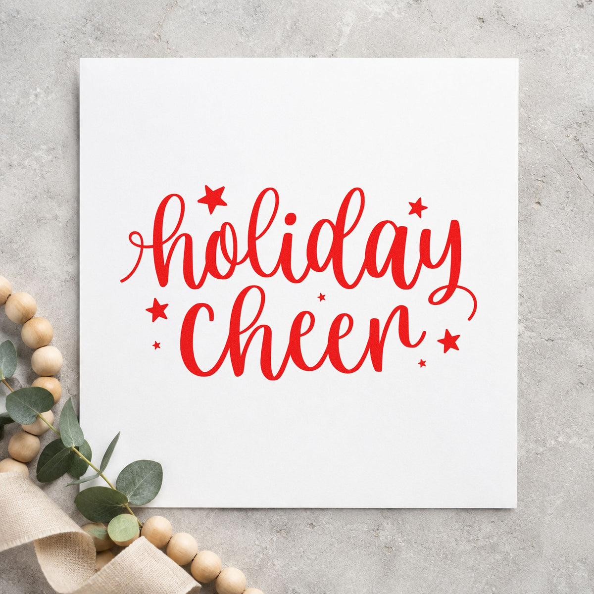 Holiday Cheer Star Lettering craft stamp in red ink on cardstock, an easy option for napkin scatter ink.