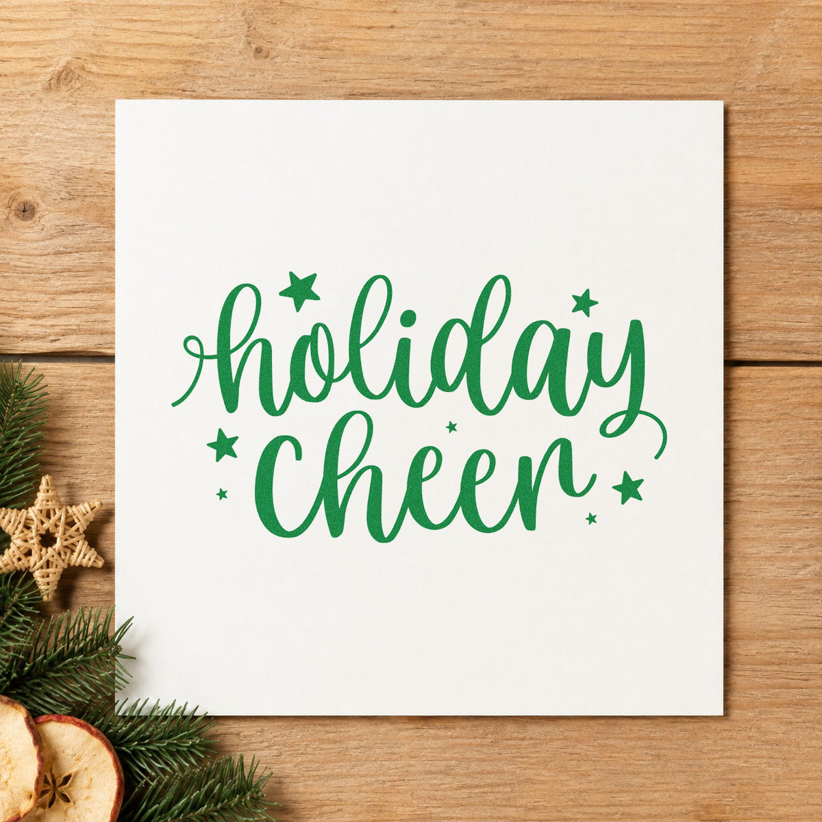 Holiday Cheer Star Lettering craft stamp imprinted in green ink on paper, a design suited to framed small ledge.