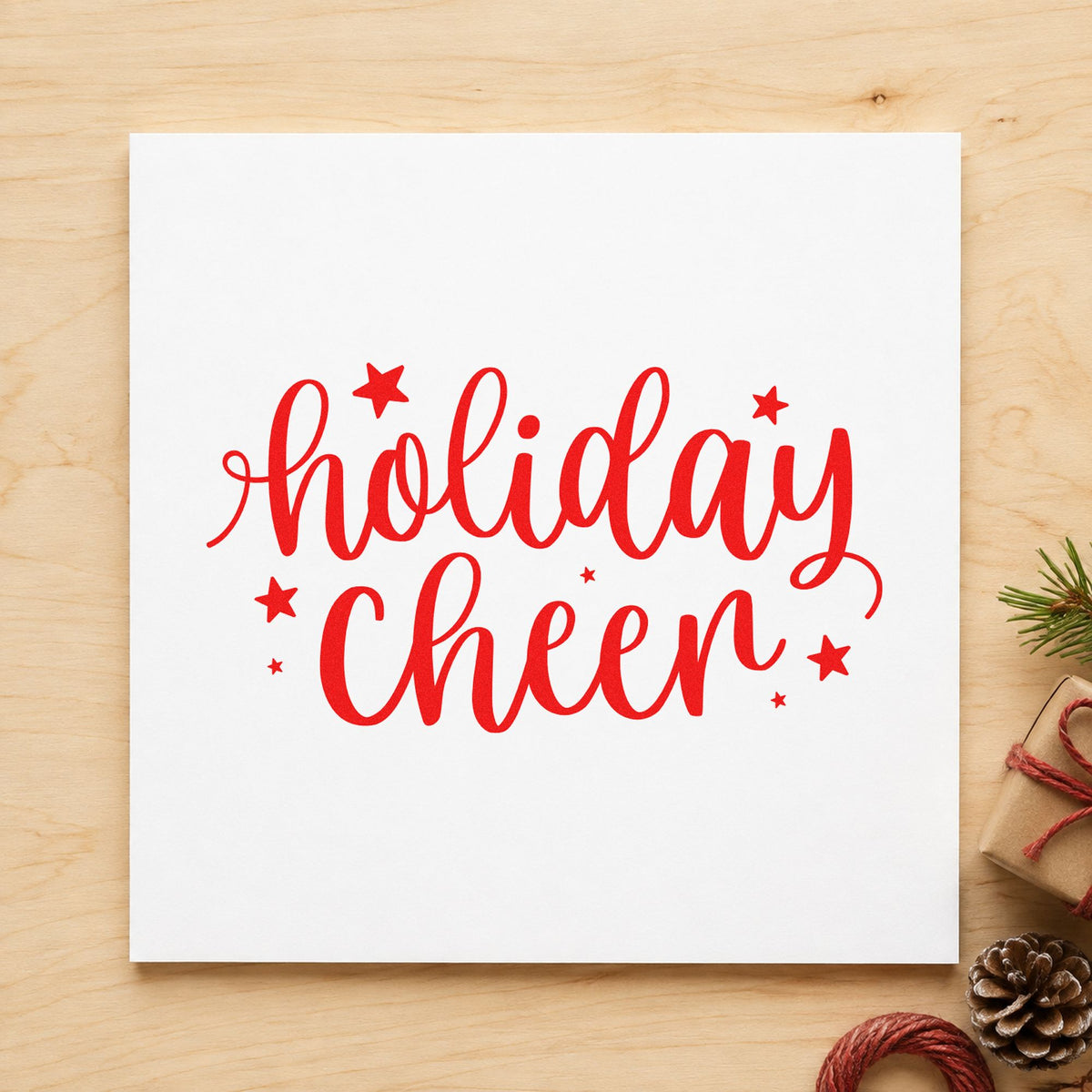 Holiday Cheer Star Lettering rubber stamp shown in red ink, stamped for projects such as tin lid labels.