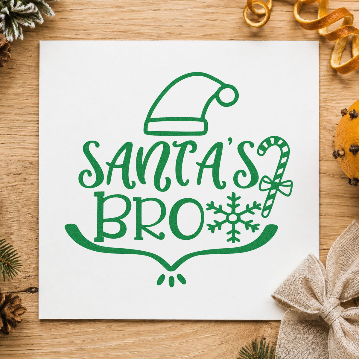 Santa's Bro Hat Candy Cane craft stamp imprint in green ink on a handmade project, one idea being brother gift tags.