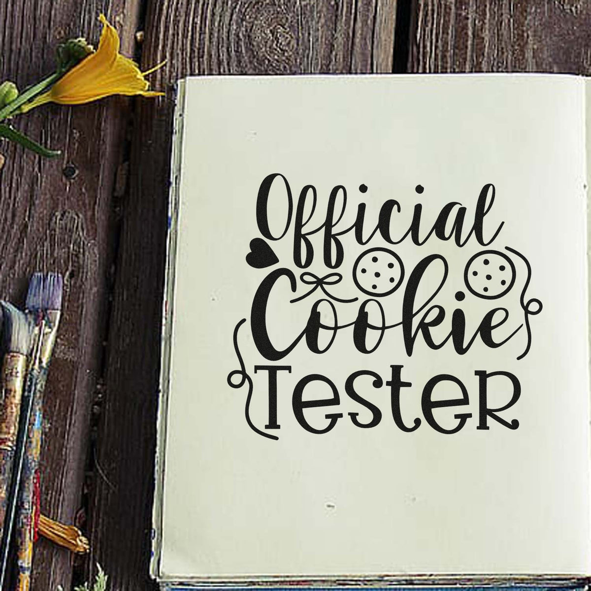 Premium Wooden Official Cookie Tester Script Lettering Stamp - Vintage Pro imprint stamped in black ink. The words "Official cookie tester" include two round cookies and a small heart.