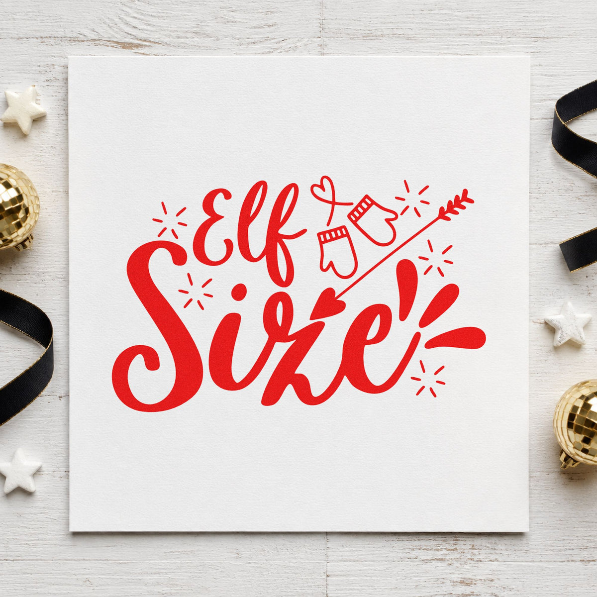 Elf Size Mittens Arrow rubber stamp shown in red ink, stamped for projects such as small bin labels.