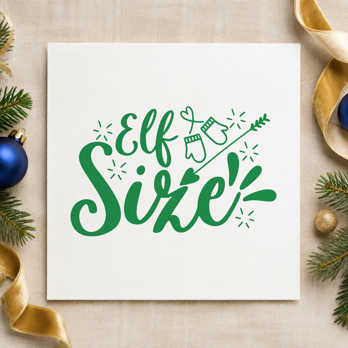 Elf Size Mittens Arrow craft stamp imprint in green ink on a handmade project, one idea being craft fair cards.