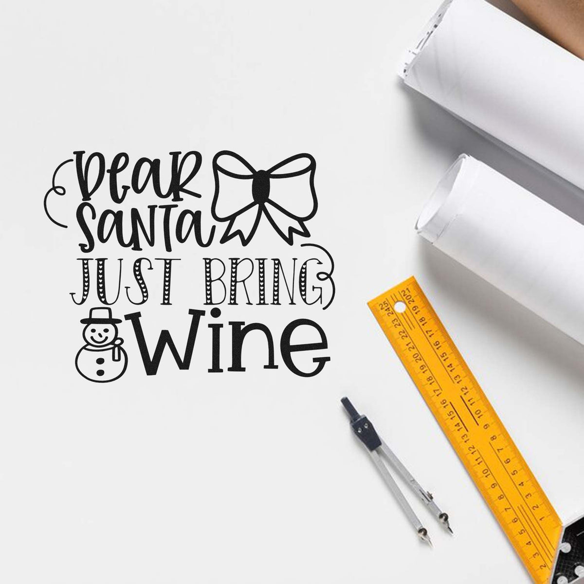 Black Dear Santa Just Bring Wine stamp and seal design with bow, snowman, white blanks, and yellow ruler.