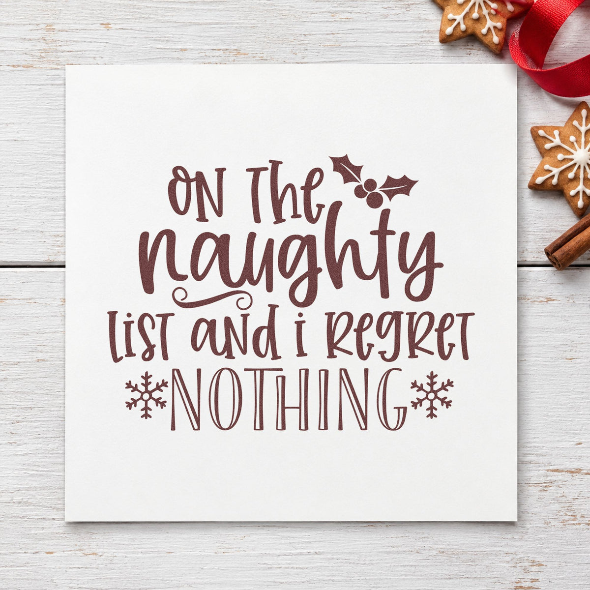 Naughty List Regret Nothing rubber stamp printed in brown ink, ready for decision log sheet and similar paper crafts.