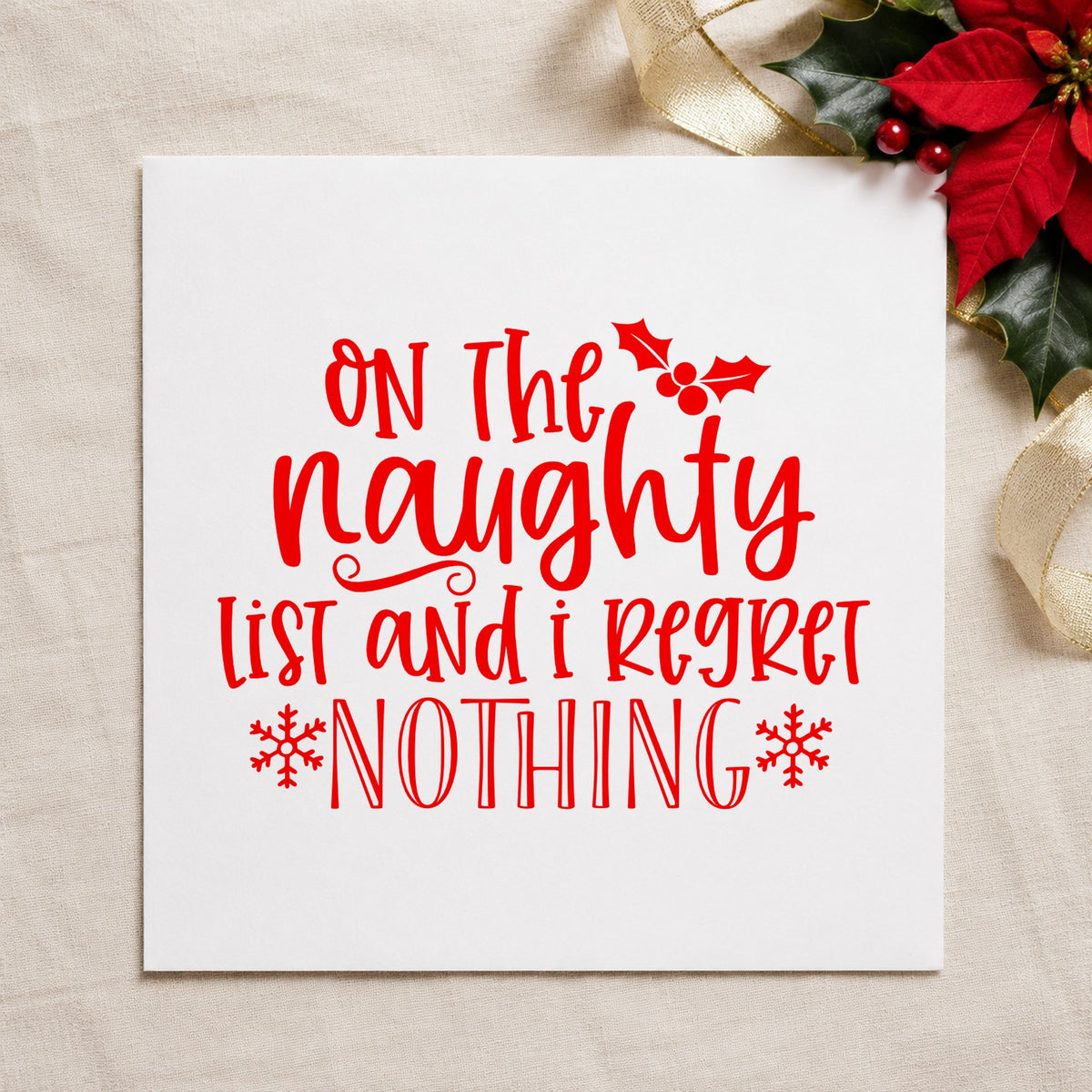 Naughty List Regret Nothing craft stamp in red ink on cardstock, an easy option for scarf panel printing.