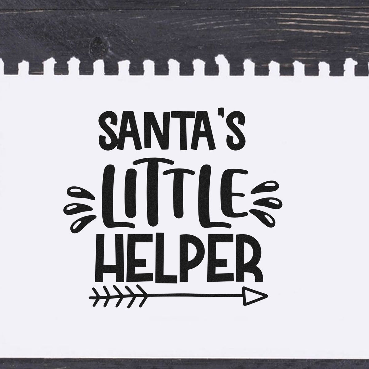Black Santas Little Helper stamp and seal design on white, with bold text, arrow accent, and playful decorative marks.