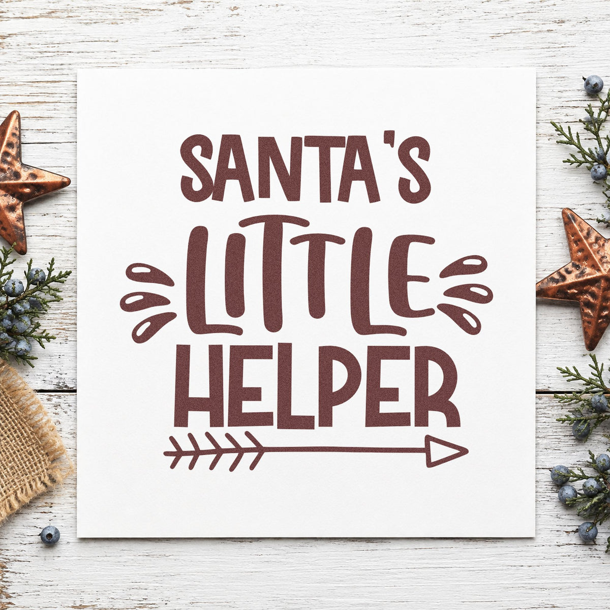 Santa's Little Helper Arrow rubber stamp printed in brown ink, ready for job split sheet and similar paper crafts.