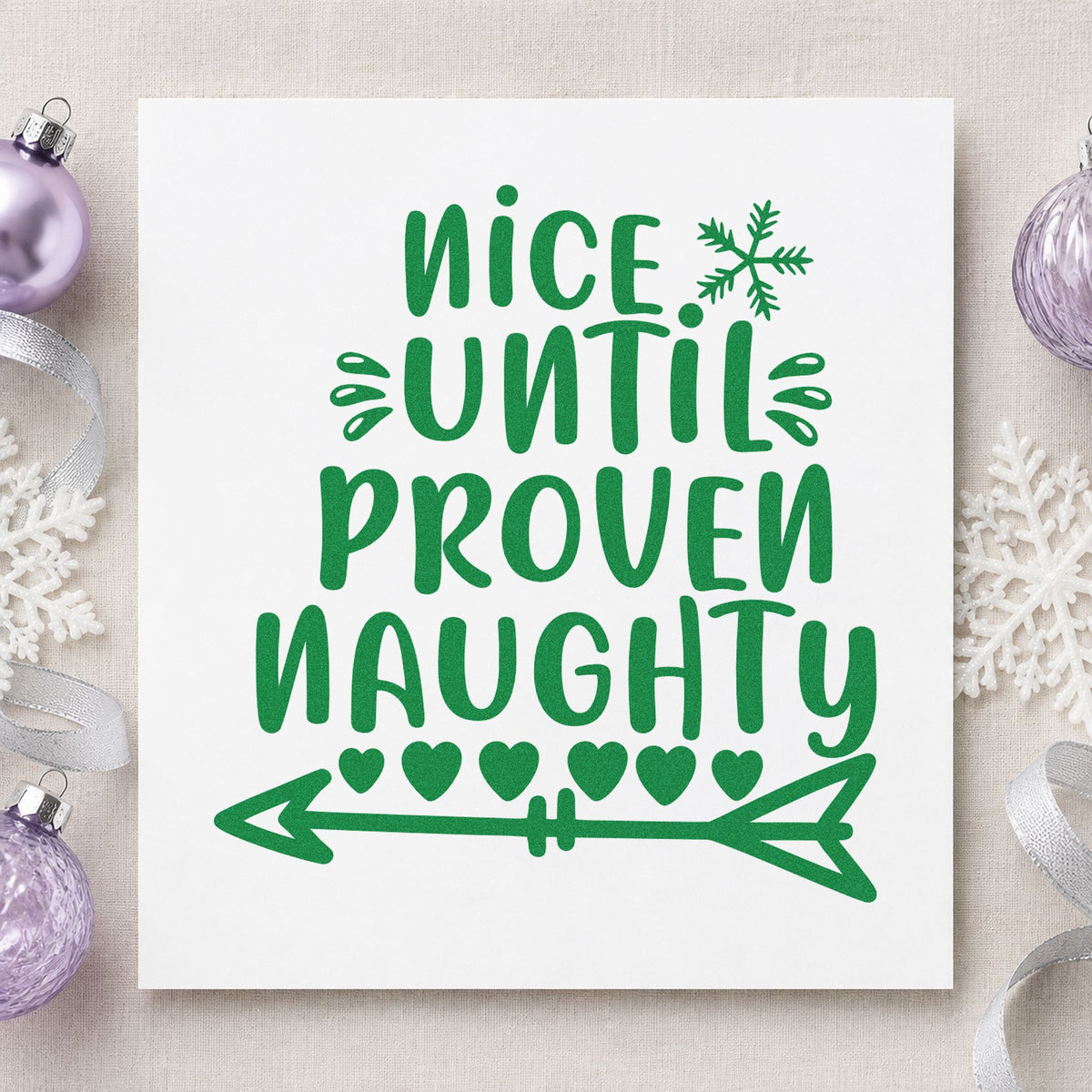 Nice Until Proven Naughty craft stamp imprinted in green ink on paper, a design suited to framed office wall.
