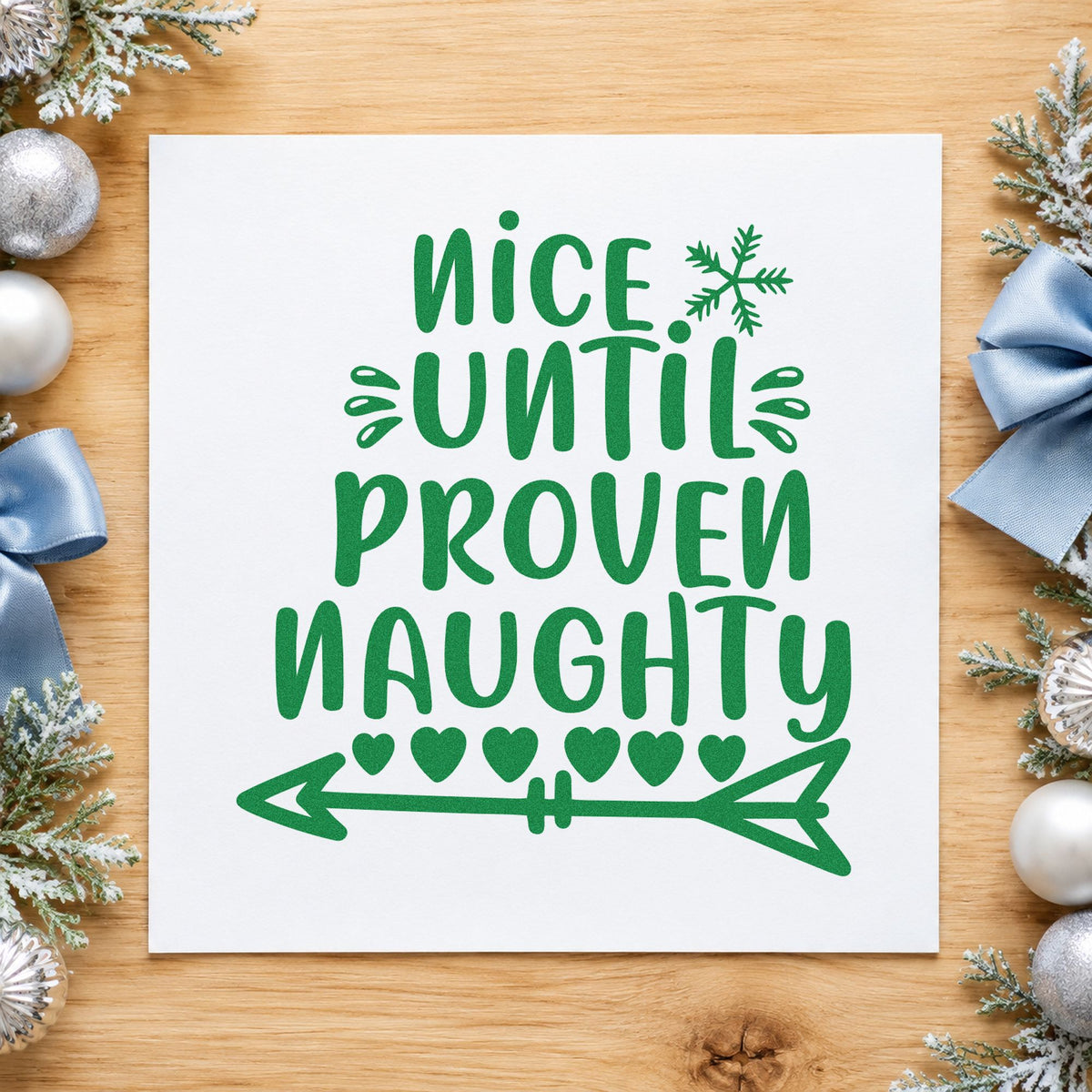 Nice Until Proven Naughty craft stamp imprint in green ink on a handmade project, one idea being mock trial cards.
