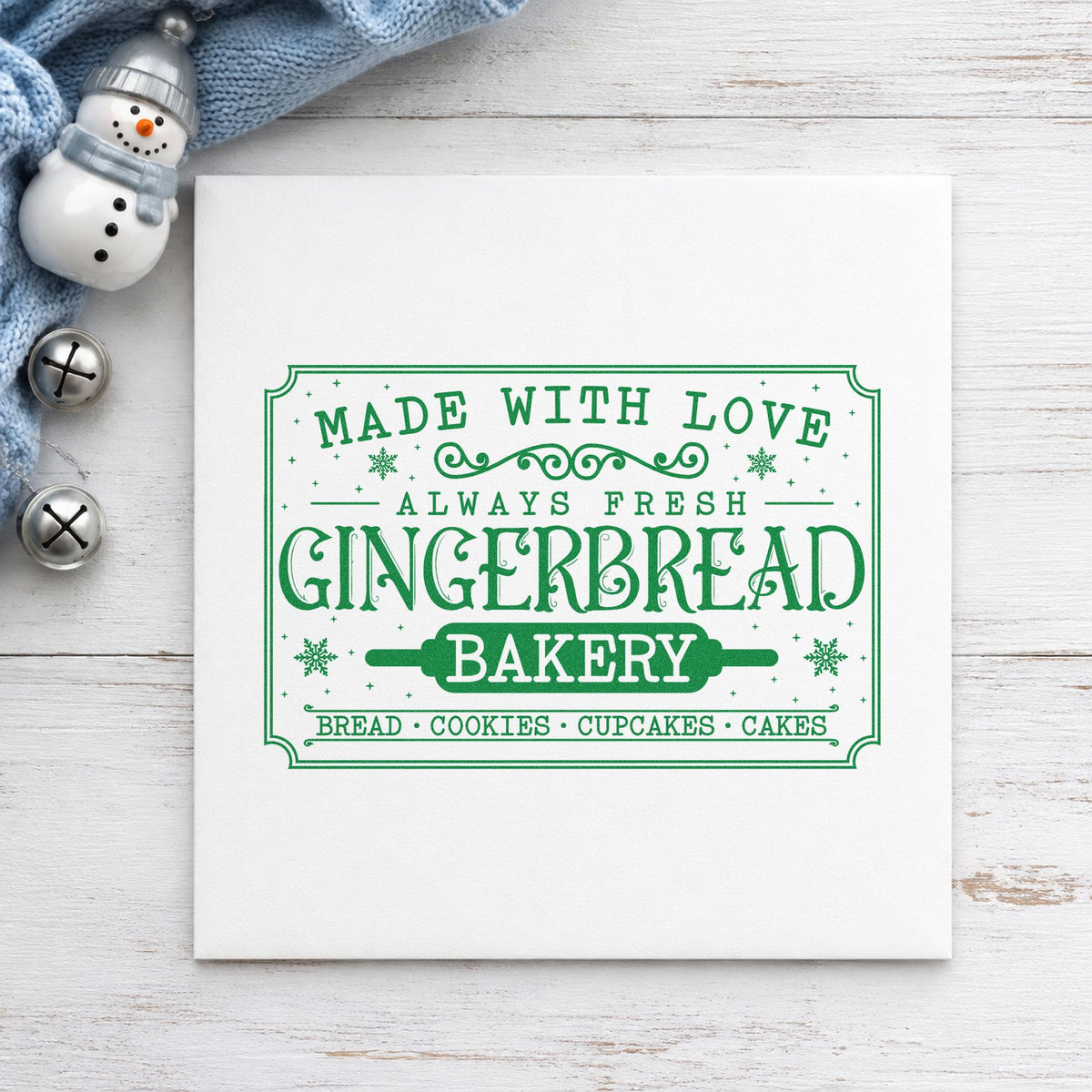 Gingerbread Bakery Vintage Sign craft stamp imprint in green ink on a handmade project, one idea being order slip cards.