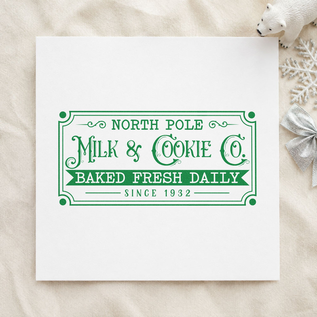 North Pole Milk Cookie Company craft stamp imprinted in green ink on paper, a design suited to framed dairy wall.