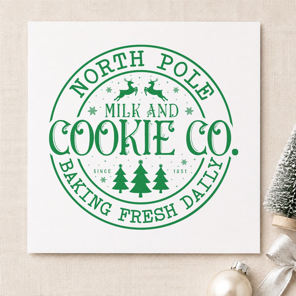 North Pole Cookie Company Circle craft stamp imprint in green ink on a handmade project, one idea being loyalty punch cards.
