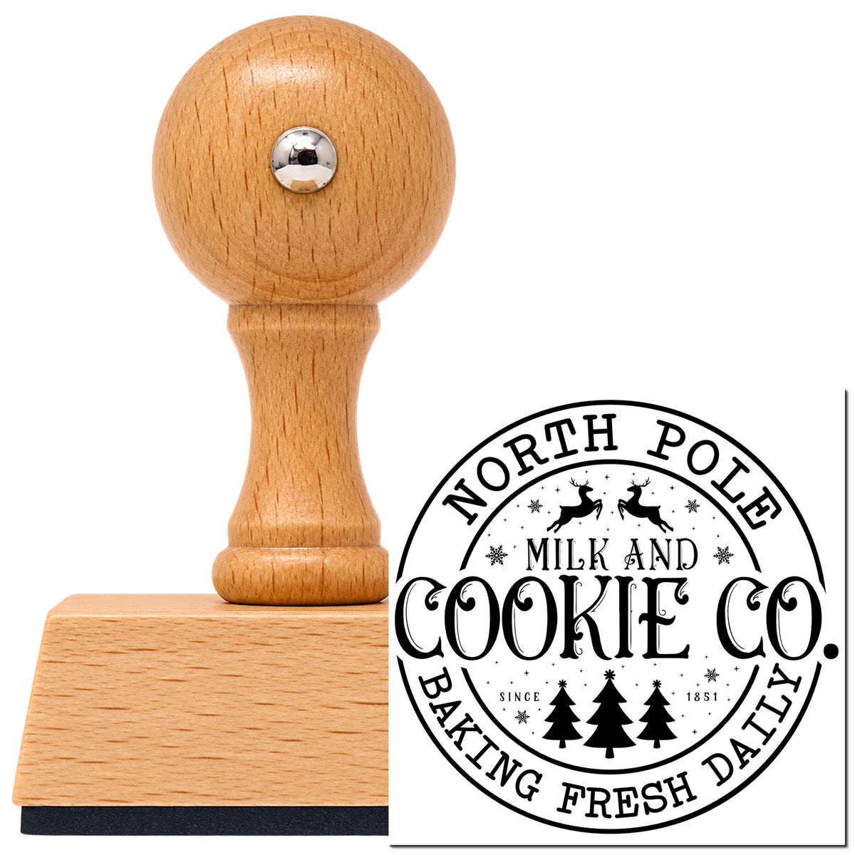 Vintage Pro beech wood stamp with a round knob handle, shown with its black North Pole Cookie Company Circle Reindeer imprint on white.
