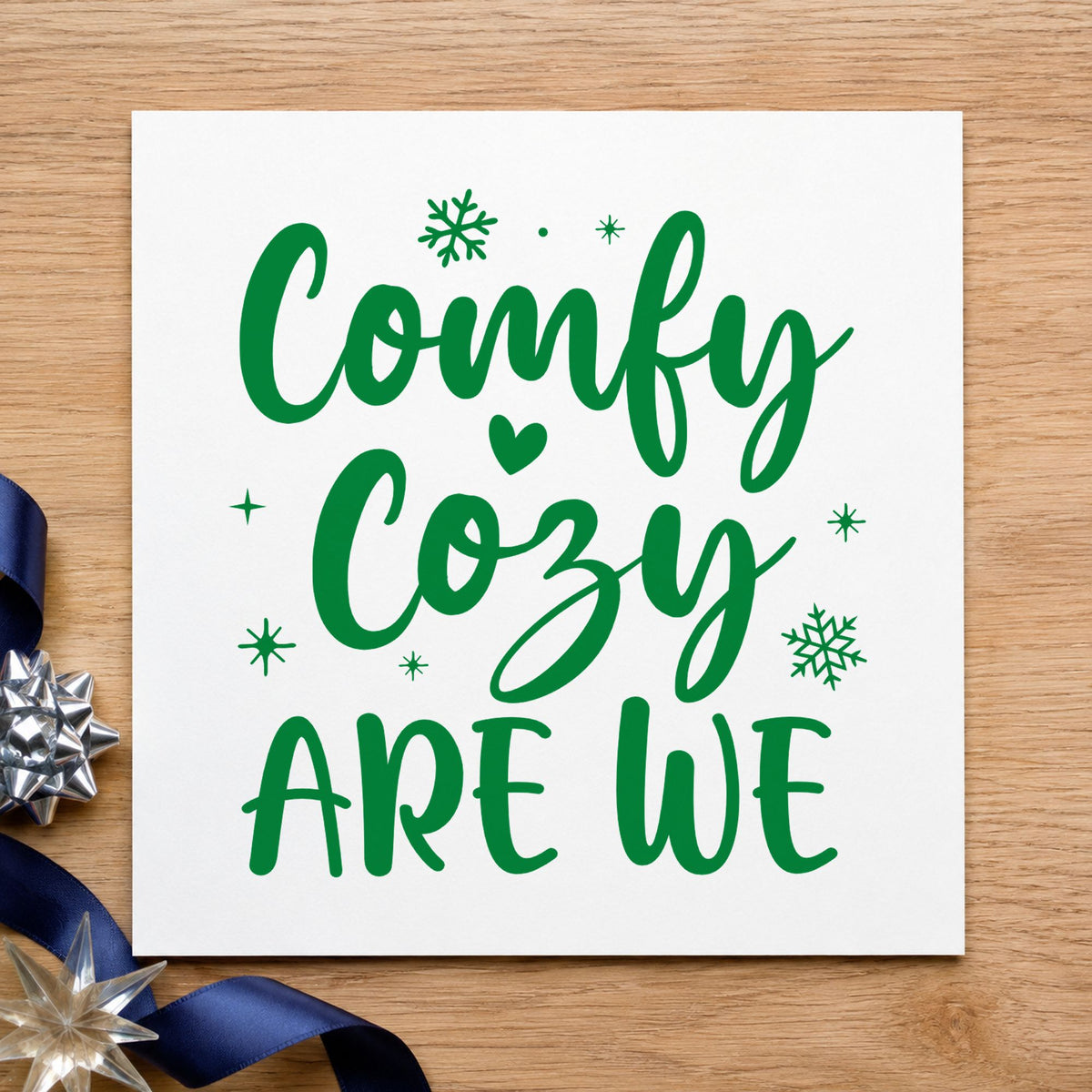 Comfy Cozy Are We craft stamp imprinted in green ink on paper, a design suited to framed den shelf.