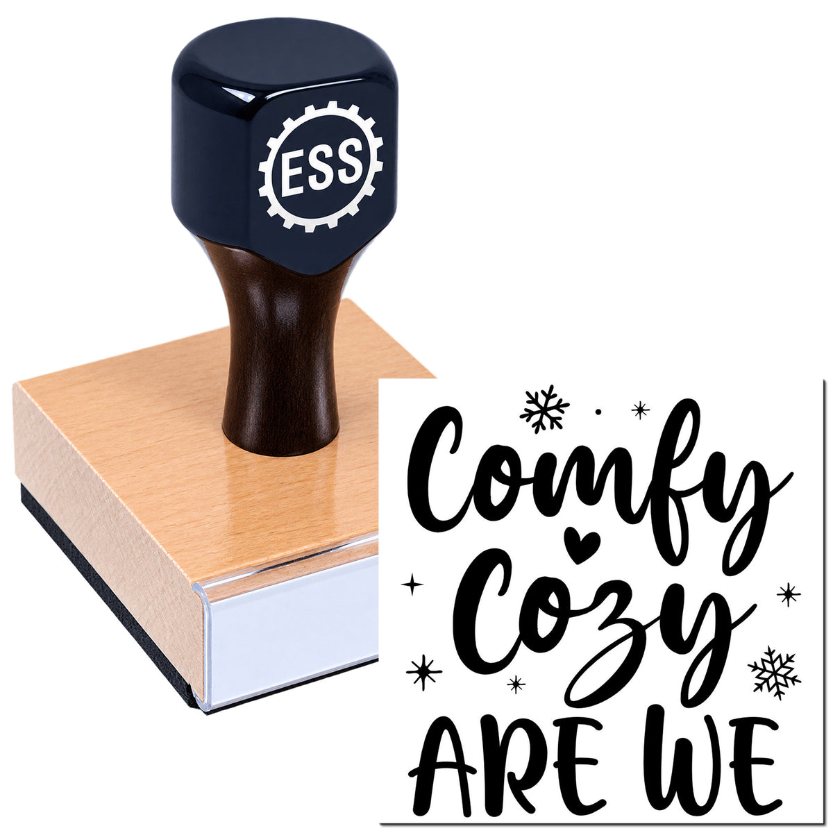 Navy ESS rubber stamp on wood block with black "Comfy Cozy" seal design, snowflakes, and heart accents