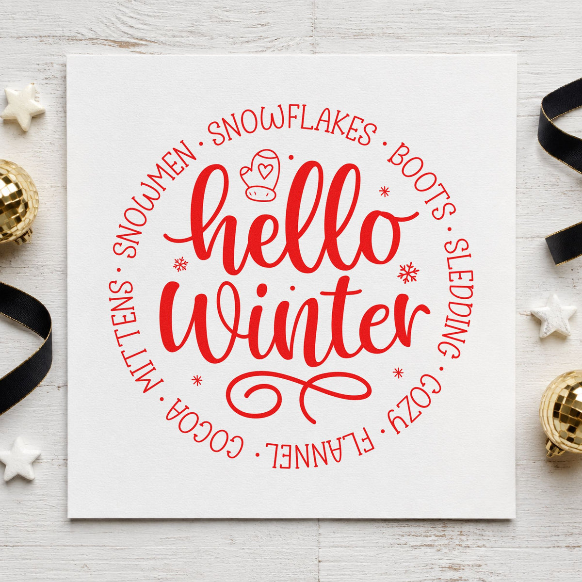Hello Winter Circular Words craft stamp in red ink on cardstock, an easy option for cushion ring printing.