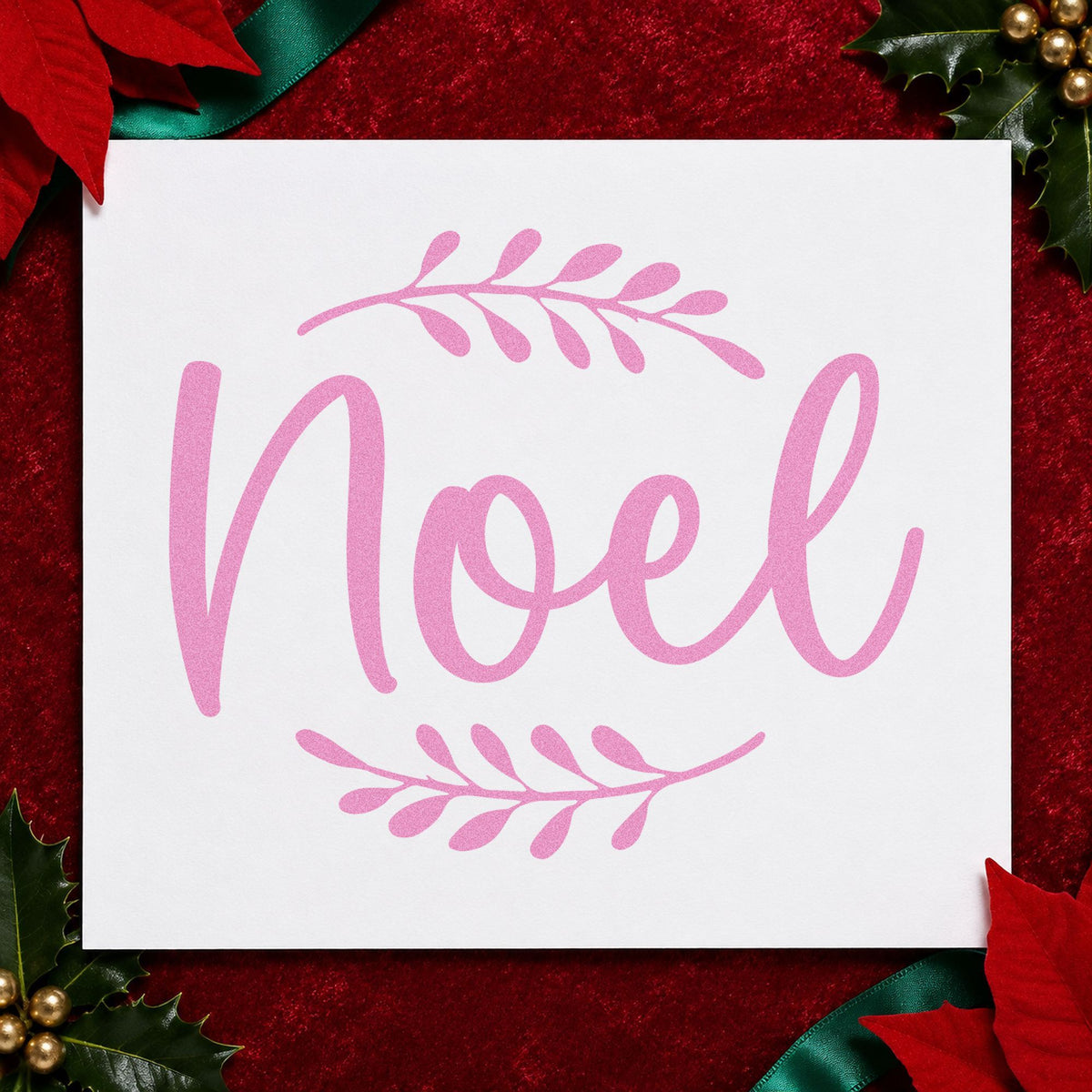 Noel With Leafy Sprigs craft stamp in purple ink on cardstock, an easy option for single word album.