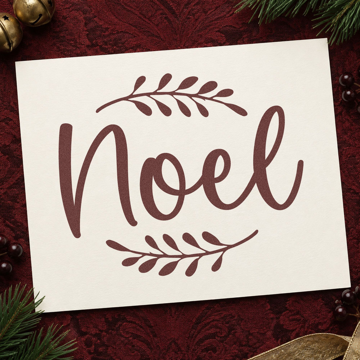 Noel With Leafy Sprigs rubber stamp printed in brown ink, ready for month break sheet and similar paper crafts.