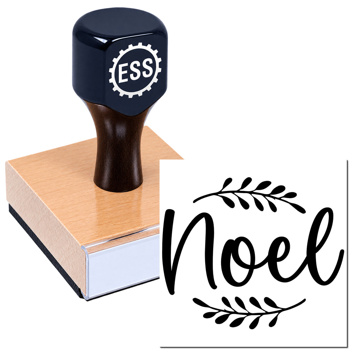 Navy ESS rubber stamp seal on a wooden block, showing black "Noel" script with leaf accents.
