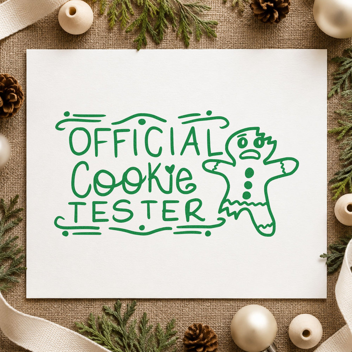 Official Cookie Tester Gingerbread craft stamp imprint in green ink on a handmade project, one idea being ruled entry tags.