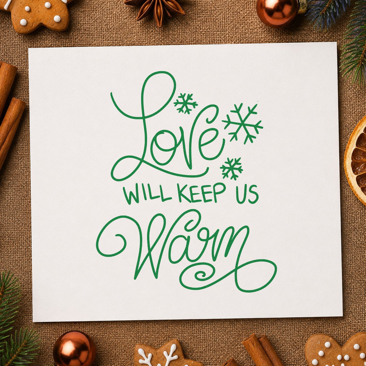 Love Will Keep Us Warm craft stamp imprint in green ink on a handmade project, one idea being anniversary menus.