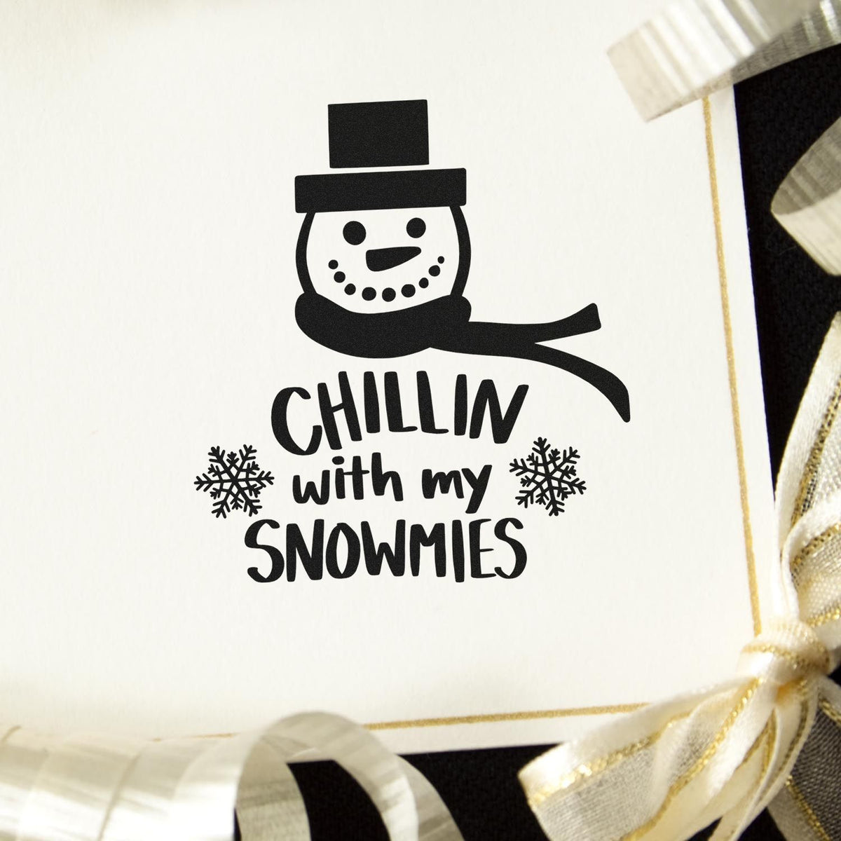 Black snowman stamp/seal with hat, scarf and snowflakes; text reads Chillin with my snowmies on white card.