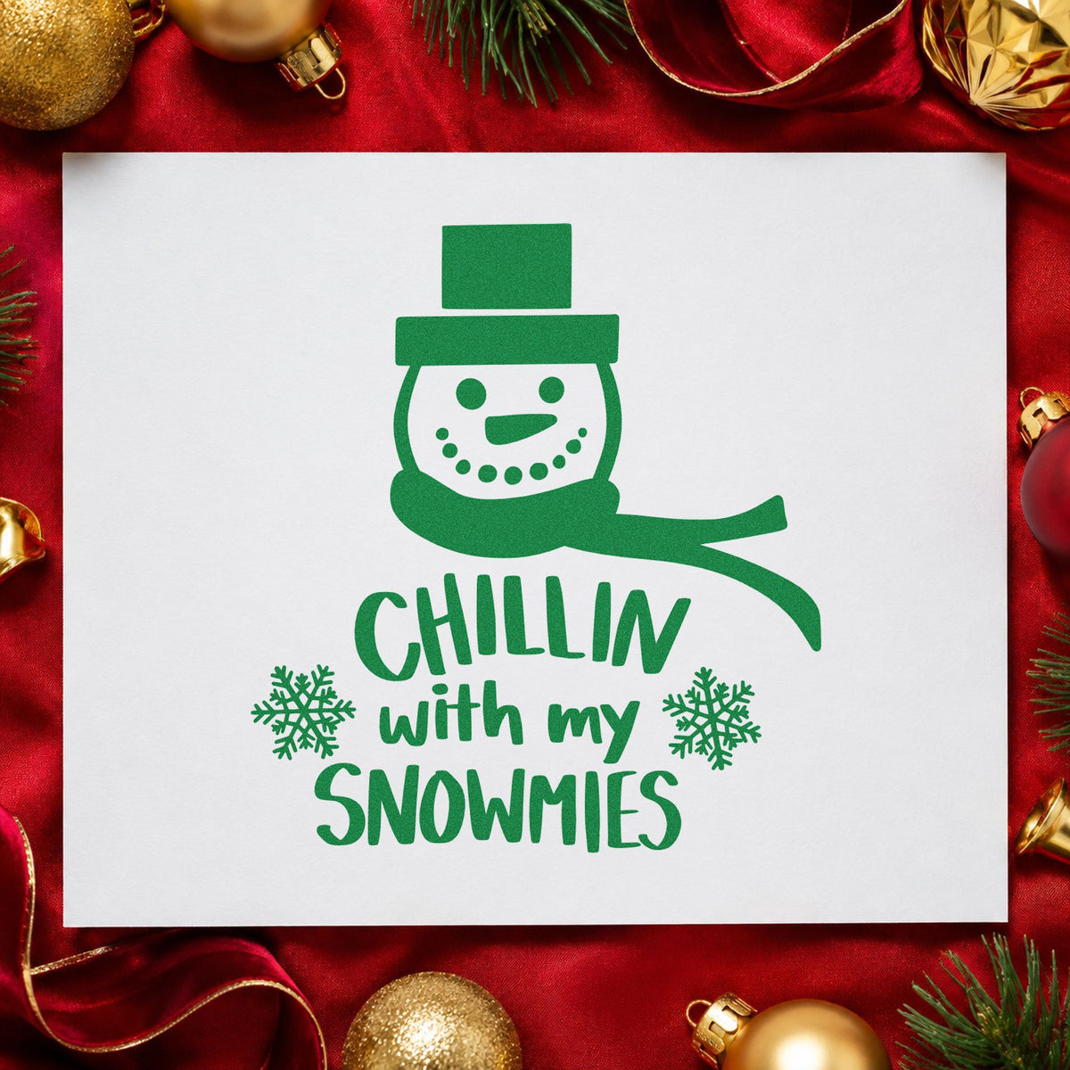 Chillin With My Snowmies craft stamp imprint in green ink on a handmade project, one idea being scarf kit gift tags.